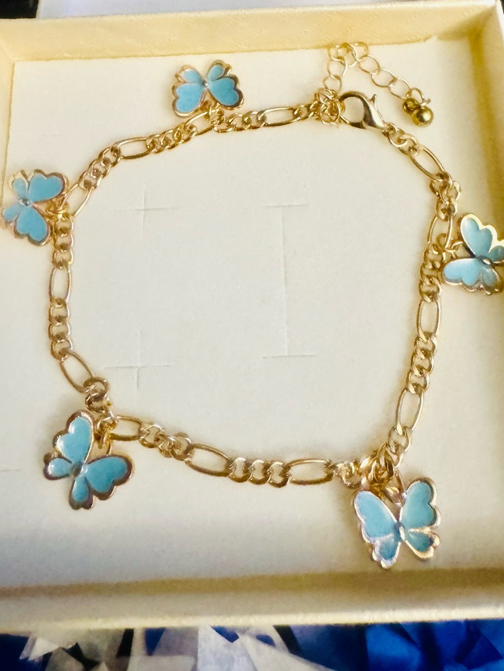 Gold Butterfly Charm Bracelet with Light Blue Enamel